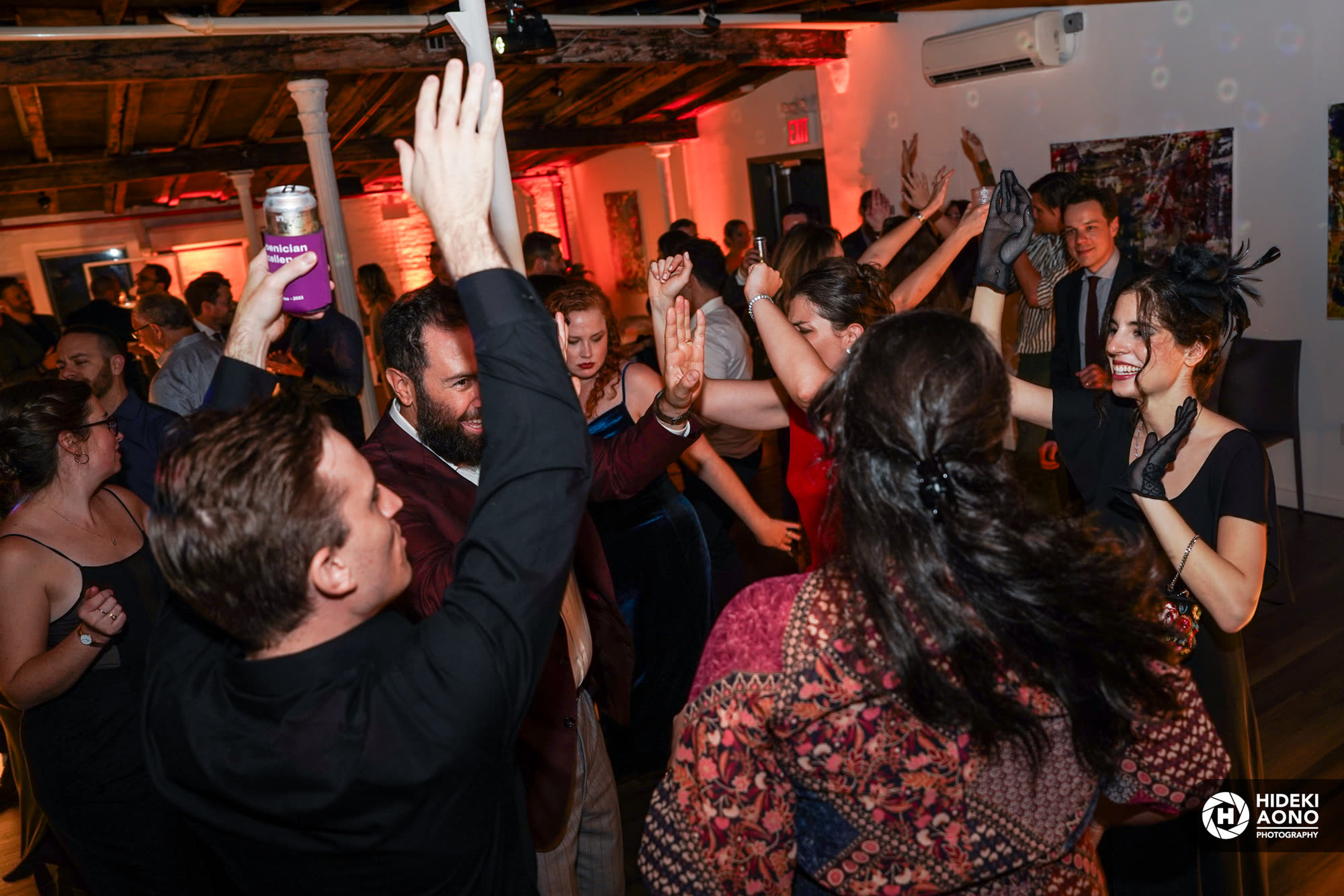 Guests packed onto the dance floor with their hands in the air